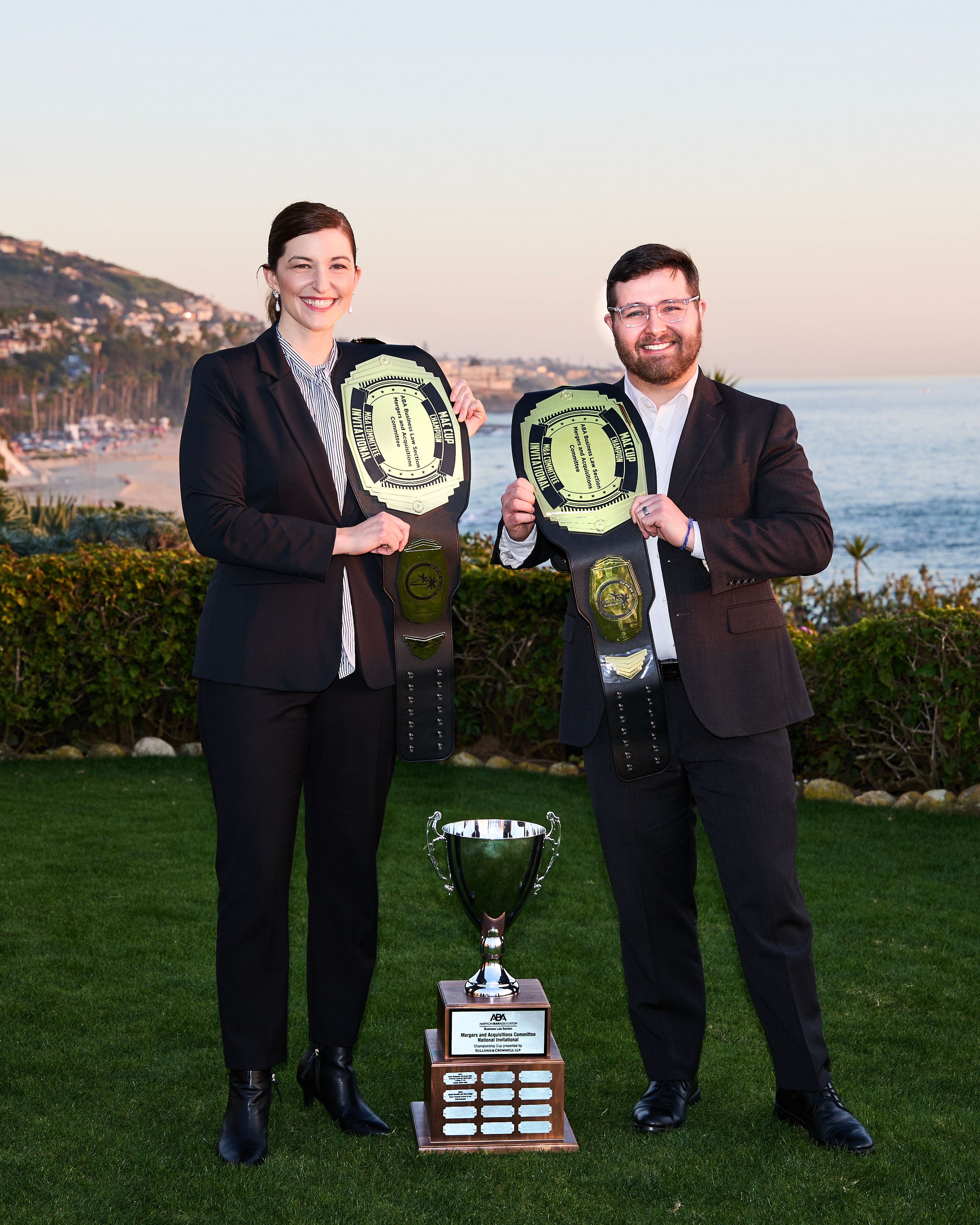 Erica Lovell and Jason Collyer with ABA Transactional Championship Belts and Trophy
