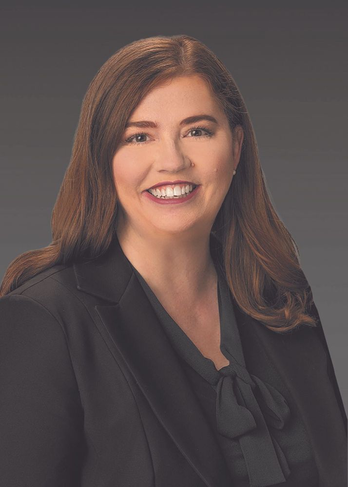 Michelle Reed (’03)